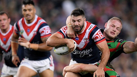 The custodian: James Tedesco is tackled by George Burgess and Cameron Murray.
