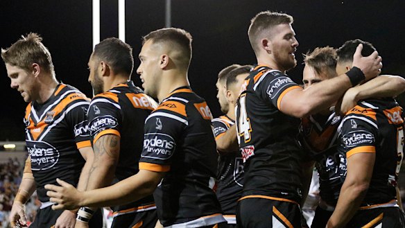 Mauling: Tigers players celebrate a David Nofoaluma first-half try.