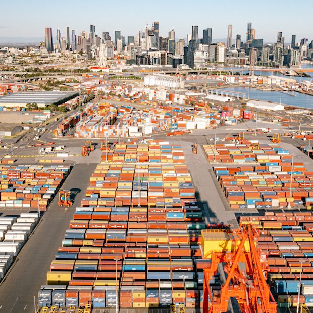 An aerial view of Swanson Dock East with the city skyline in the background. 