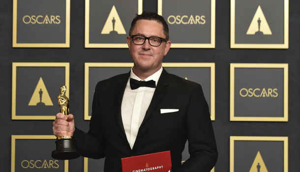 Greig Fraser in the press room with his Oscar for best cinematography for Dune.