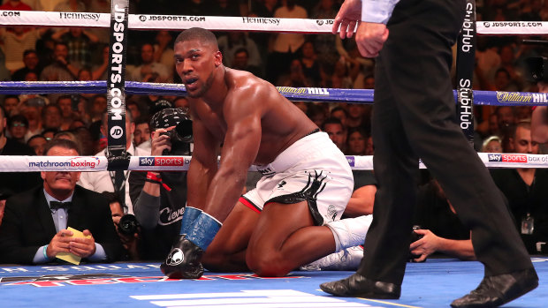 Down and out: Anthony Joshua has suffered his first career loss.