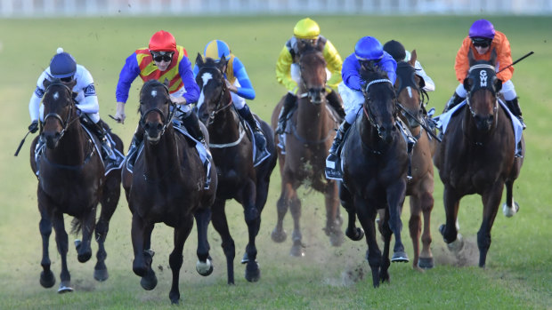 Got you this time: Pierata, (red cap)  turns the tables on Kementari (blue) in the Missile Stakes at Randwick.  
