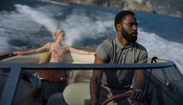 Still running: Elizabeth Debicki and John David Washington in Tenet.  