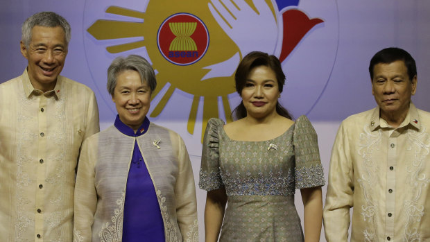 Philippine President Rodrigo Duterte, right, and his partner Honeylet Avancena, second right, with Singapore Prime Minister Lee Hsien Loong, left, and his wife last year.