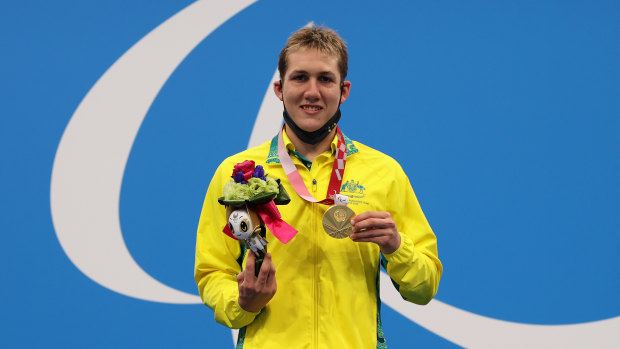 Will Martin celebrates won a gold medal in the S9 400m freestyle final. 