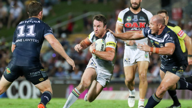 James Maloney of the Panthers looks for a gap in the Cowboys defence.