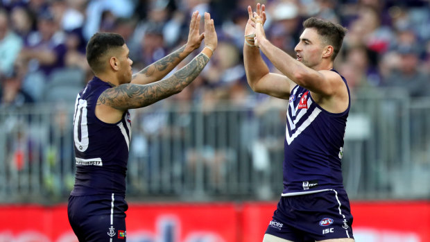 Michael Walters (left) with Shane Kersten, who had a reported falling out with Ross Lyon over Lachie Neale.