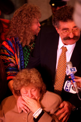 Bruno Grollo with his wife and daughter outside court after the verdict.