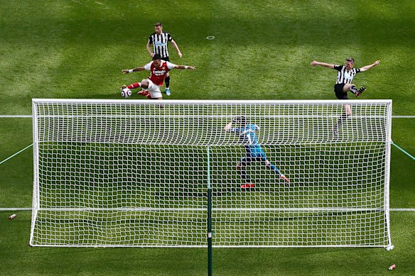 Arsenal’s Pierre-Emerick Aubameyang scores against Newcastle United at St James’ Park.