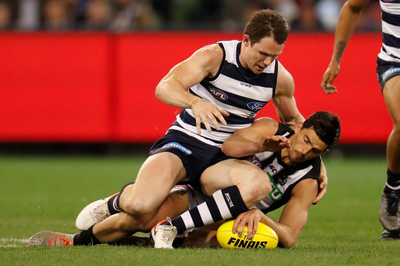 Patrick Dangerfield and Scott Pendlebury compete for the ball in last Friday's qualifying final.