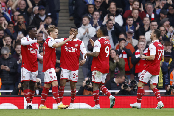 Arsenal’s Martin Odegaard (second from left) celebrates after scoring his side’s fifth goal.