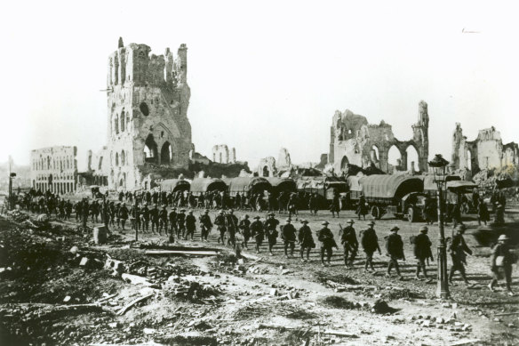 Australian troops on the way to take up a front-line position in the ruins of Ypres. 