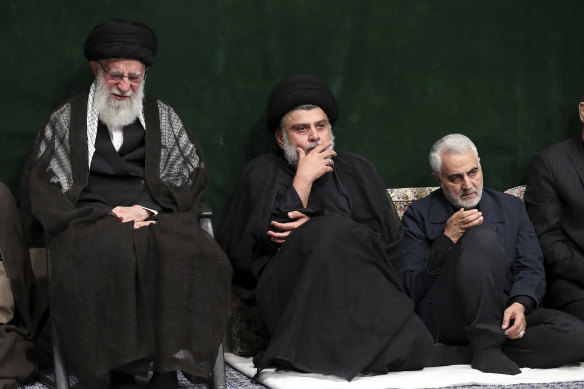 From left: Supreme Leader Ayatollah Ali Khamenei, Iraqi Shiite cleric Muqtada al-Sadr and Qasem Soleimani, the now deceased commander of Iran's Quds Force, attend a mourning ceremony in September 2019.
