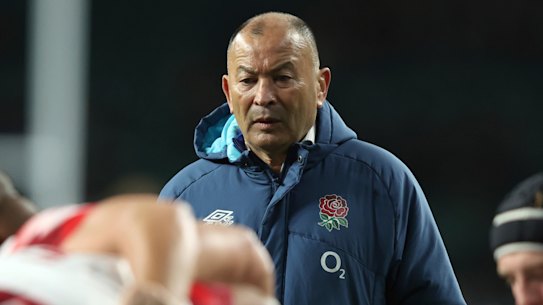 England’s coach Eddie Jones watches players warm up before the international rugby match between England and South Africa at Twickenham stadium in London, Saturday, Nov. 26, 2022. (AP Photo/Ian Walton)