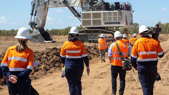 Workers at the Adani Carmichael coal mine this month.