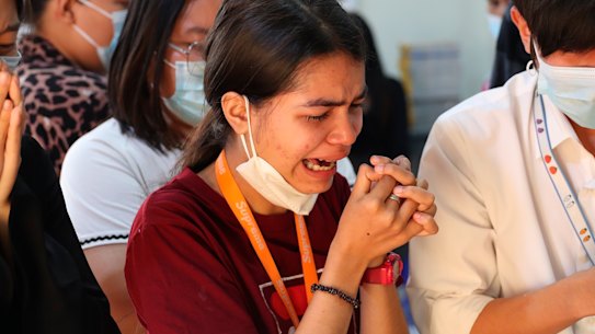 Friends of Kyal Sin –  also known as Angel, and by her Chinese name Deng Jia Xi – visit her body.