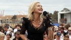 Olivia Newton-John singing before the running of the Melbourne Cup in 2009. 