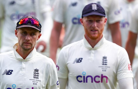 Joe Root and Ben Stokes trudge off the Gabba after the first Test.