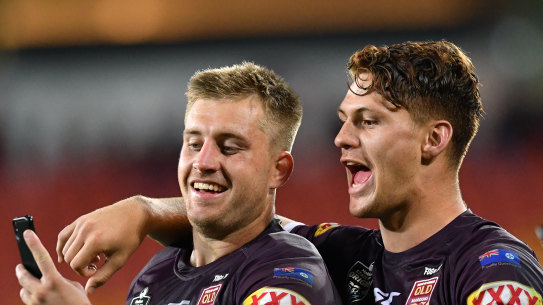 Laughing:  Cameron Munster takes a happy snap with Kalyn Ponga after Origin I.