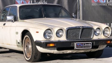 Sir Joh's car, a 1982 Jaguar, is up for grabs
