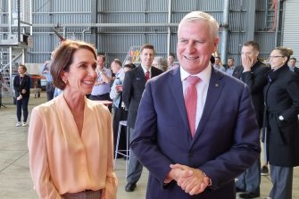 Virgin Australia boss Jayne Hrdlicka and Deputy Prime Minister Michael McCormack in Brisbane on Thursday.