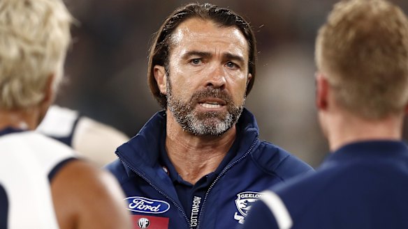 Geelong coach Chris Scott addresses his players during the MCG blockbuster against the Tigers.