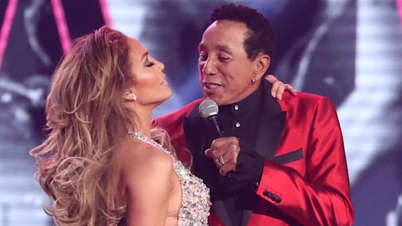Lopez and Smokey Robinson at the Grammys.