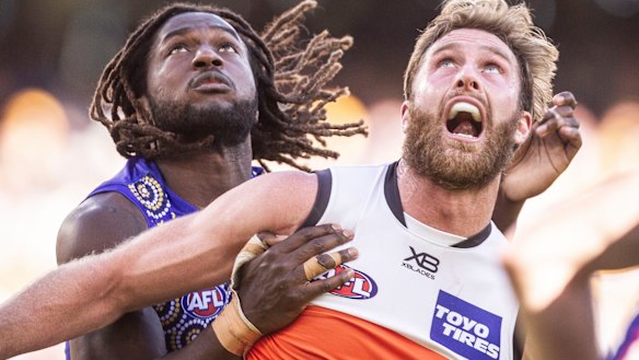 Nic Naitanui (left) and Dawson Simpson contest the ball.