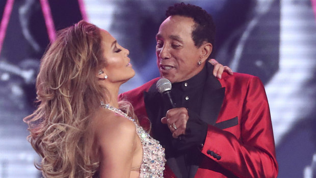 Lopez and Smokey Robinson at the Grammys.