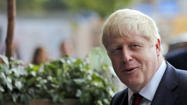 Britain's Prime Minister Boris Johnson arrives at the Conservative Party Conference in Manchester, England.
