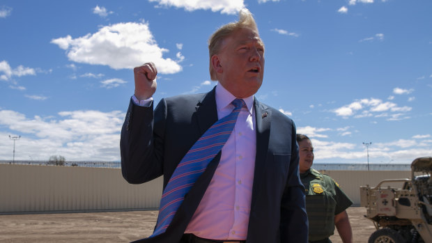 Trump speaks at a new section of the border wall with Mexico on April 5.