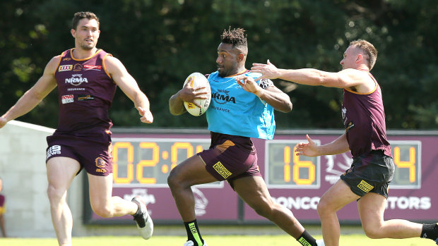 Segeyaro in action with Corey Oates (left) and Jake Turpin during training on Wednesday.