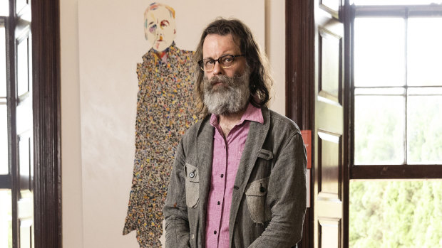 The artist, who goes by the moniker what, with his winning portrait of Robert Forster. 