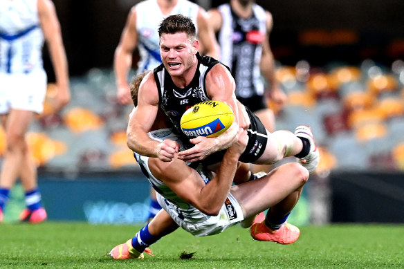 In the thick of it: Collingwood star Taylor Adams.