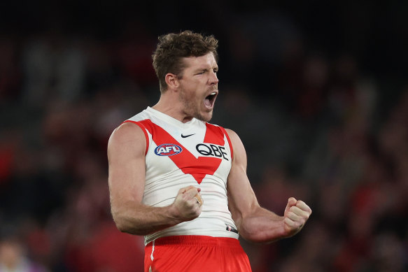 Luke Parker of the Swans celebrates kicking a goal against Essendon