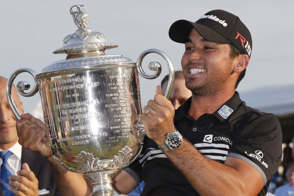 Jason Day lifts the Wanamaker trophy after winning the 2015 PGA Championship.