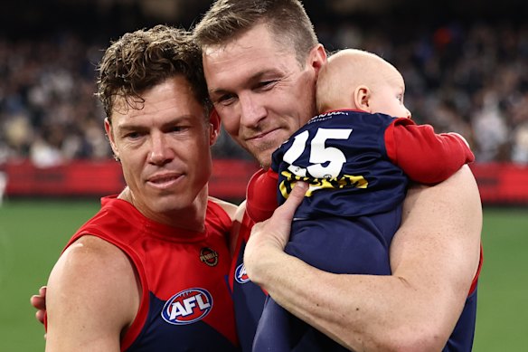 Jake Melksham and Tom McDonald after their final AFL games.