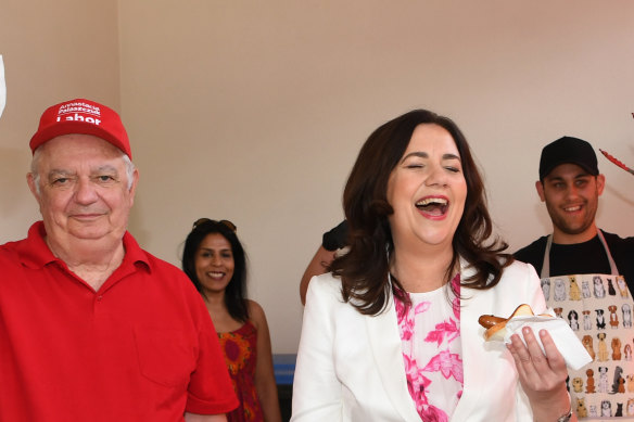 Premier Annastacia Palaszczuk with her father, Henry Palaszczuk, voting at Inala State School in October. 