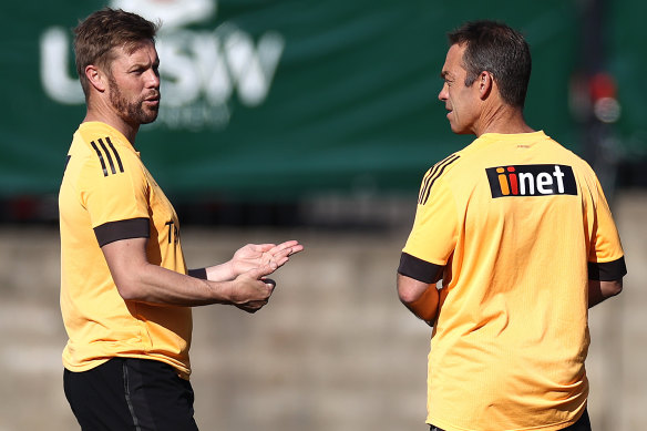 Sam Mitchell and Alastair Clarkson last year.