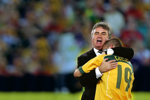 Guus Hiddink and Jason Culina celebrate the Socceroos' drought-breaking qualification for the 2006 World Cup.