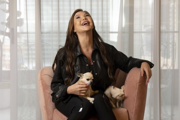 Sex worker Christine McQueen with her dogs, Chanel and Daddy.