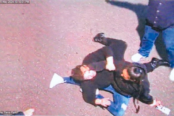 Ebony Bell, wearing a black sweater and jeans, was struggling with another person during the incident.