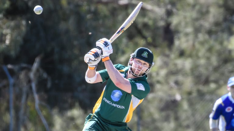 Weston Creek Molongolo's John Rogers hits out.