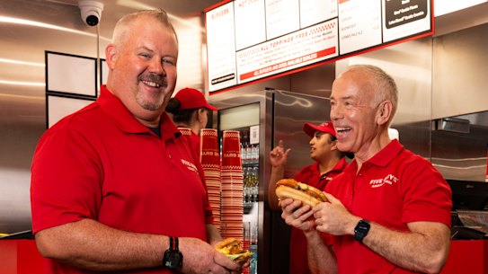 Phil Keelan, Five Guys AU Head of Operations, and Joel Bearden, Five Guys VP of marketing, at the newly opened Martin Place Metro outlet.