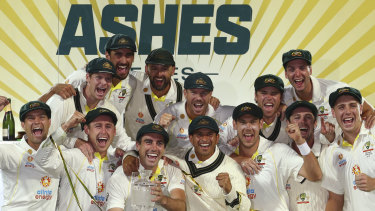 Usman Khawaja and the victorious Australia team celebrate without booze.
