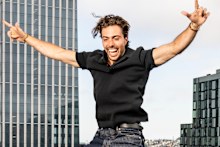 Max Marchione on his office rooftop in San Francisco. The start-up founder often begins his day by bouncing on a trampoline.