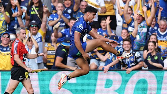 Blaize Talagi celebrates a try on his NRL debut.