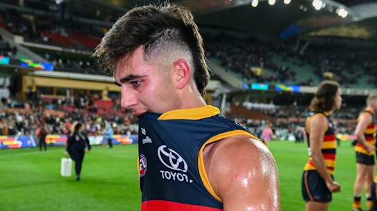 A disappointed Josh Rachele leaves the field after the loss to the Bombers.