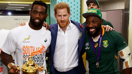 Royal seal: Prince Harry, Duke of Sussex, with Siya Kolisi holding the Web Ellis Cup and prop Tendai Mtawarira.
