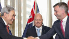 Prime Minister-elect Chris Luxon, centre, with coalition partners, New Zealand First leader Winston Peters, left, and ACT leader David Seymour at a signing ceremony.